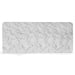 Detail of Bryson dining table showing white marble-look surface with natural veining pattern