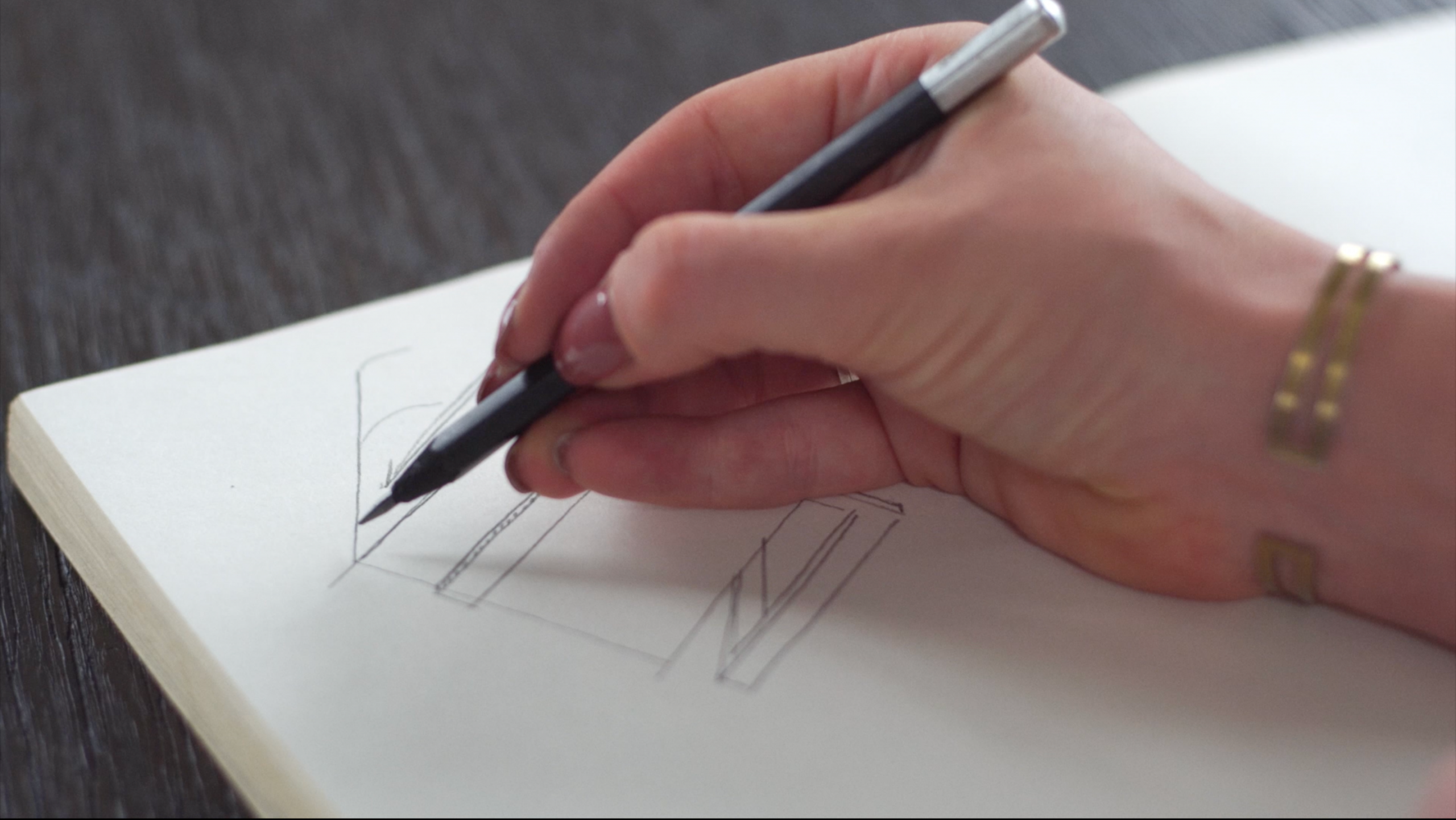 Designer Malene Lillelund drawing a sketch 2